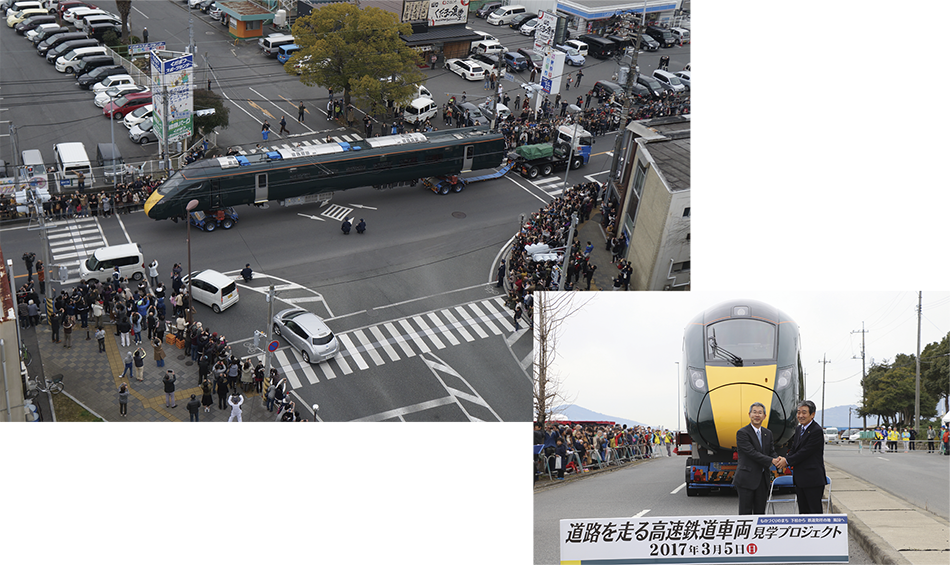 下松市内を陸送されるClass800車両（左上）と，車両の前で日立の正井健太郎常務と握手する国井益雄下松市長（右下）
