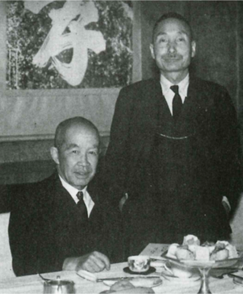 Figure 9—Hitachi Company President Namihei Odaira and Vice President Naosaburo Takao